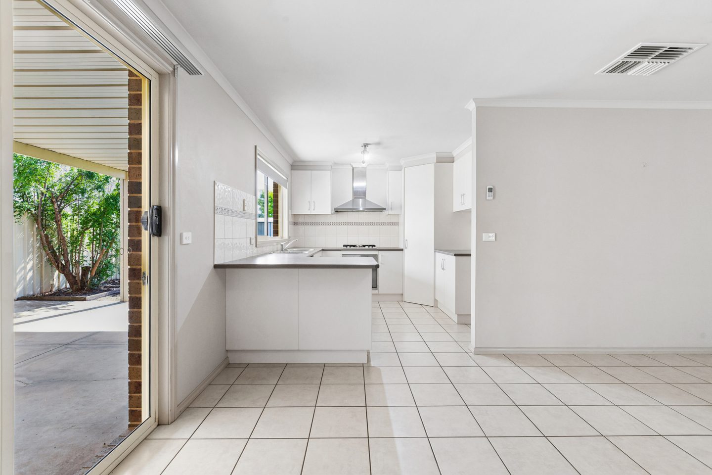 The kitchen beside the patio doors