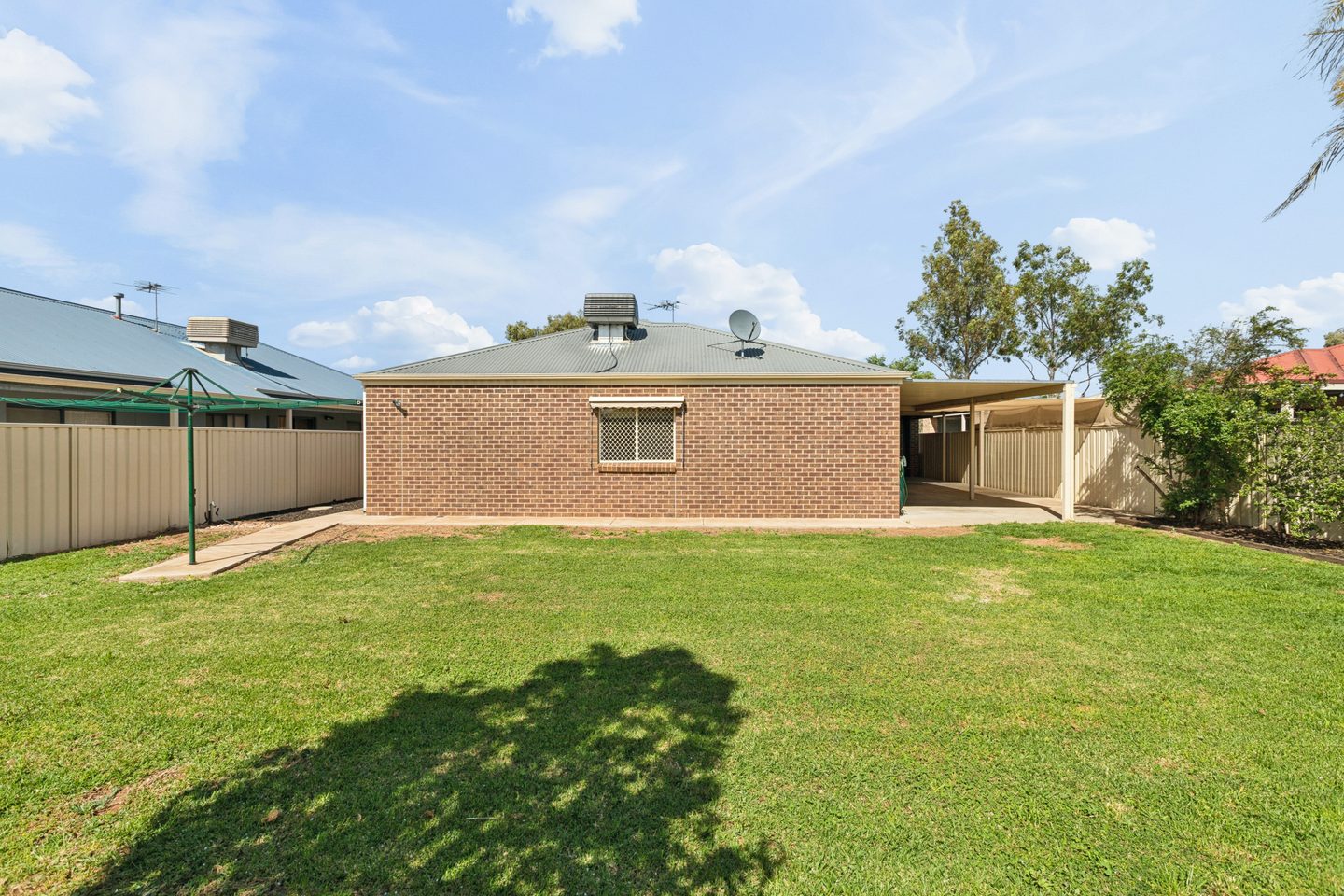 The rear of the brick home